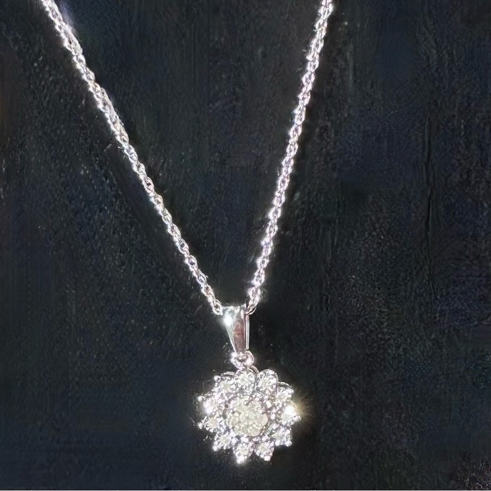 DIAMOND AND SILVER FLORAL PENDANT NECKLACE